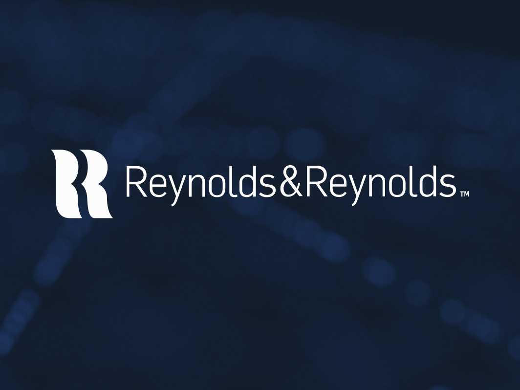 Reynolds and Reynolds logo on an abstract blue background